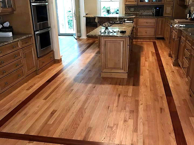 Landry Wood Flooring - Hardwood floor install with border outline
